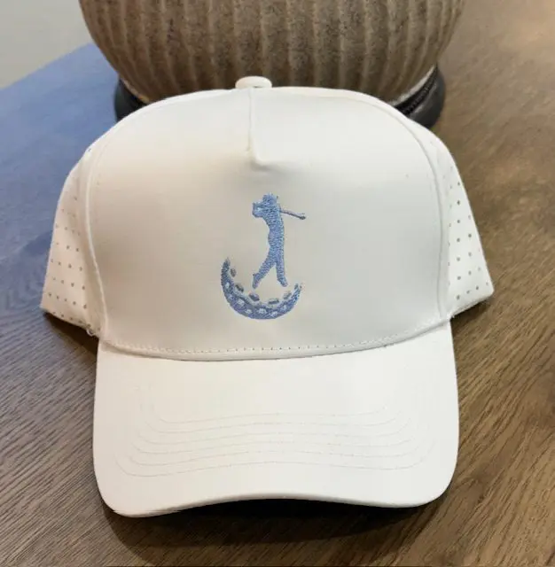A white hat with a blue logo on it