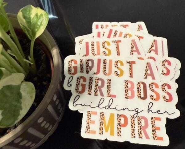A close up of some stickers on top of a table