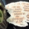 A close up of some stickers with bible verses