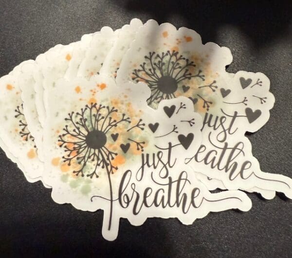 A bunch of stickers that are on top of each other.