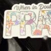 A sticker that says " when in doubt, pray ".