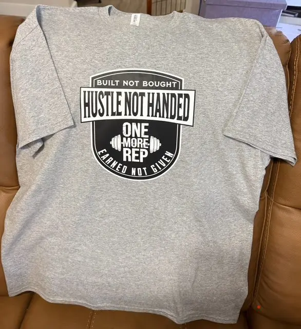 Gray t-shirt with motivational fitness text.