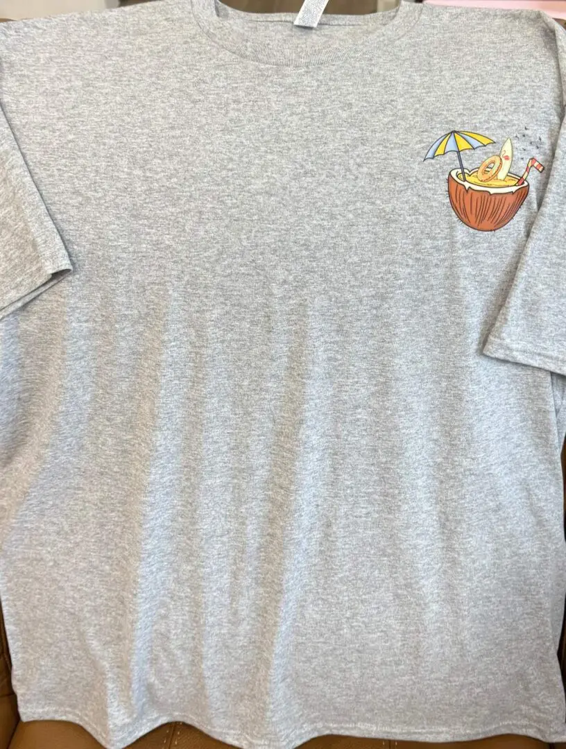 A gray t-shirt with an orange bowl of chips on it.