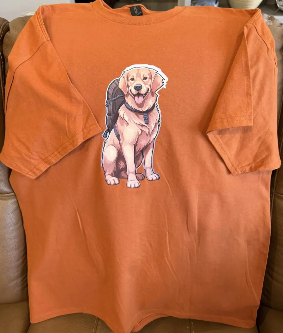 A t-shirt with a picture of a dog on it.