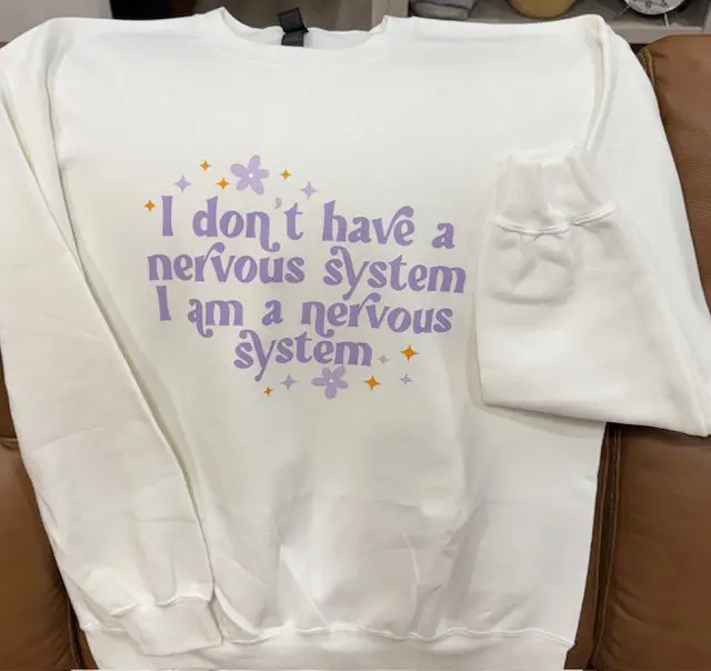 A sweatshirt that says i don 't have a nervous system.