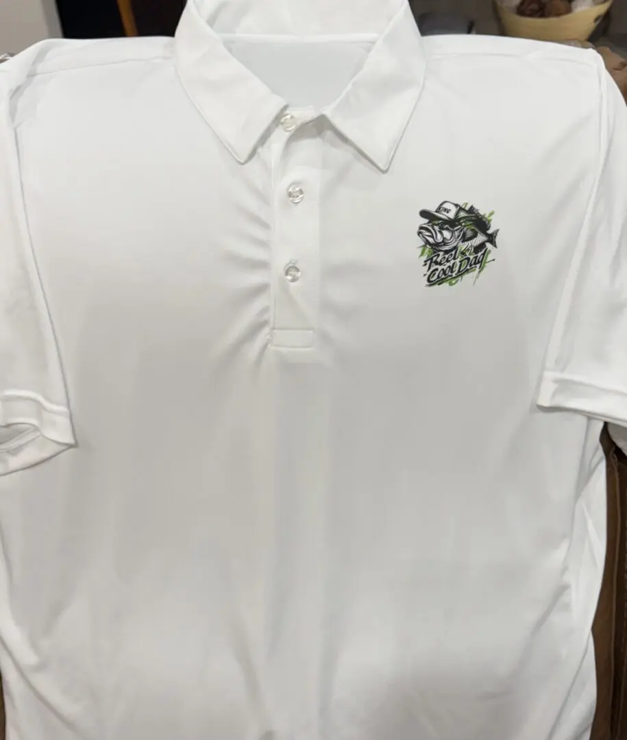 A white polo shirt with a black and silver logo.