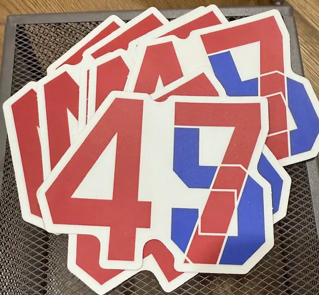 A group of red, white and blue numbers on top of a table.