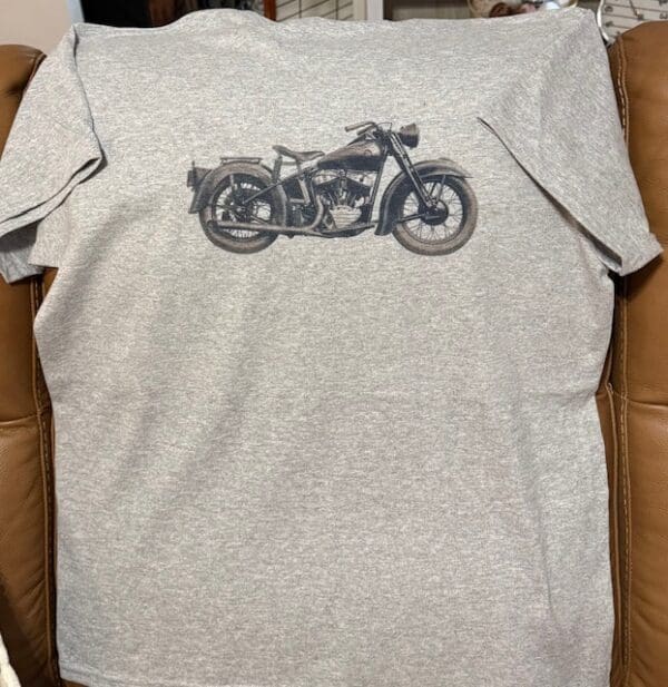 Gray T-shirt with vintage motorcycle design.