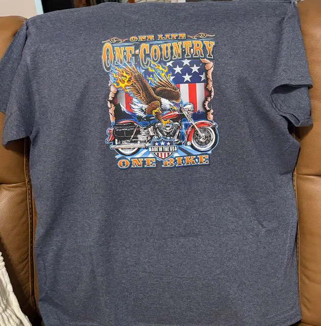 T-shirt with eagle, motorcycle, and flag design.