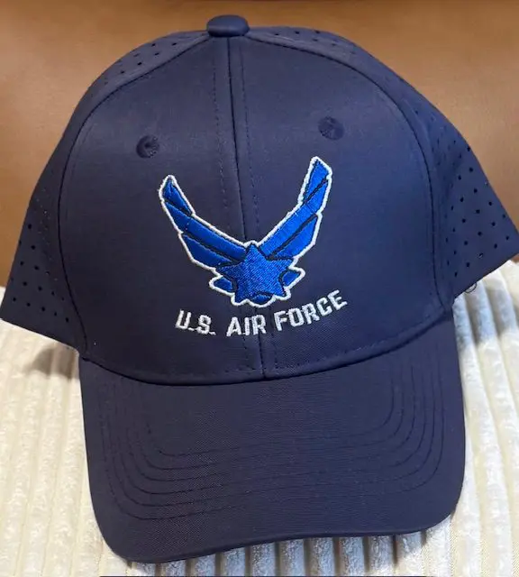U.S. Air Force logo on navy cap.