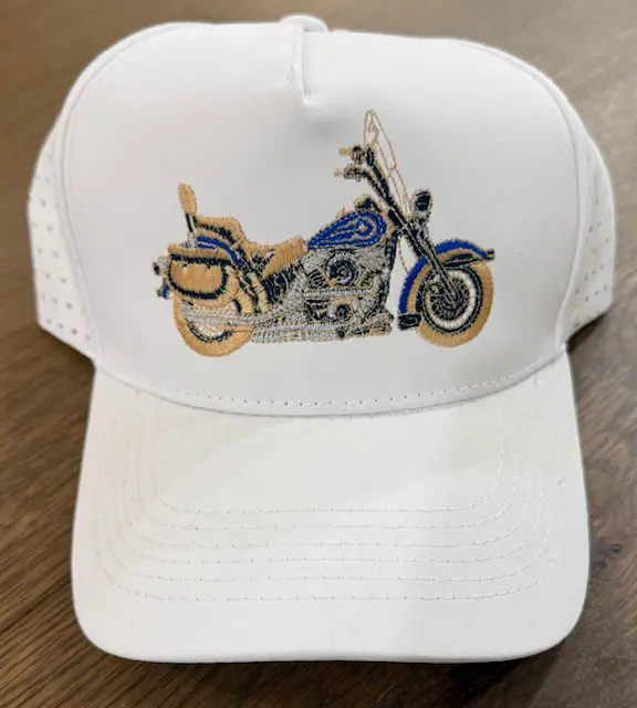 White cap with embroidered motorcycle design.