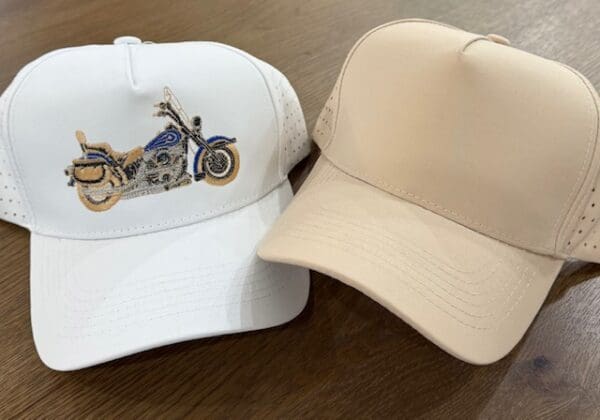 White and beige caps on table.