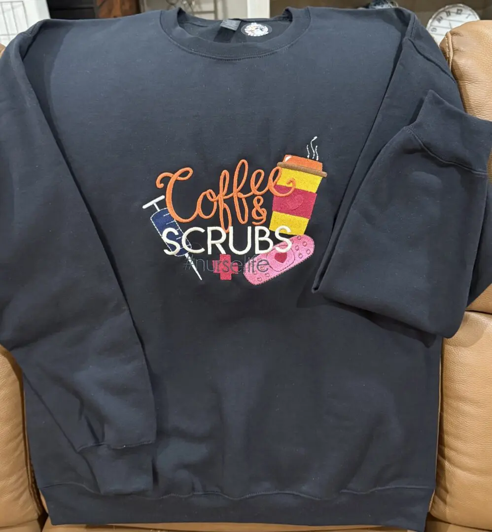 Sweatshirt with "Coffee & Scrubs" embroidery design.
