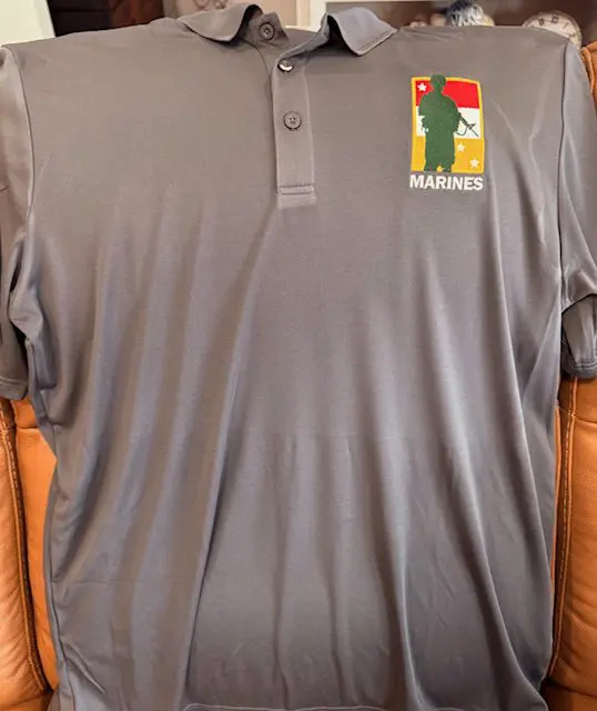 Gray polo shirt with Marines logo emblem.