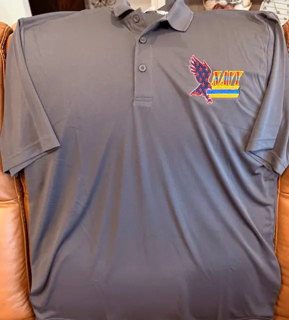 Gray polo shirt with eagle Navy logo.