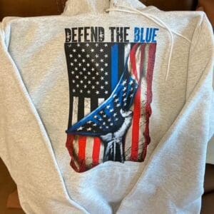 Hoodie with "Defend the Blue" design.