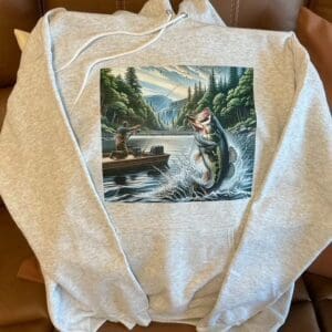 Gray hoodie with fishing scene print.