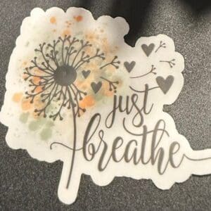 Dandelion illustration with "Just Breathe" text.