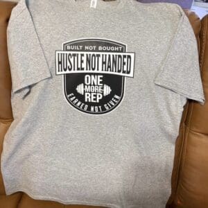 Gray T-shirt with motivational fitness text.