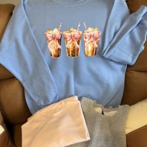 Blue sweatshirt with milkshake print design.