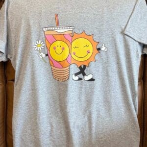 Gray t-shirt with smiling sun and drink.