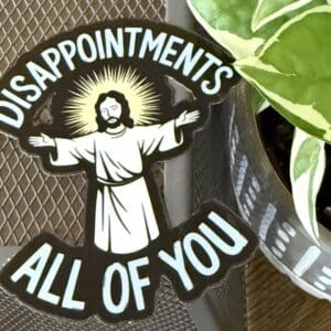 Sticker with Jesus and humorous text.