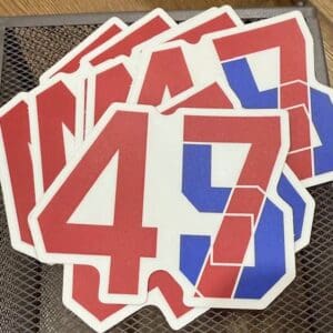 Red and blue numbers on a table.