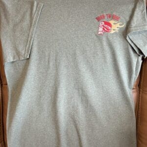 Gray t-shirt with "Born to Ride" graphic.