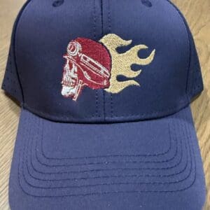 Blue cap with flaming skull embroidery.