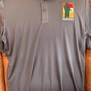 Gray polo shirt with Marines logo.