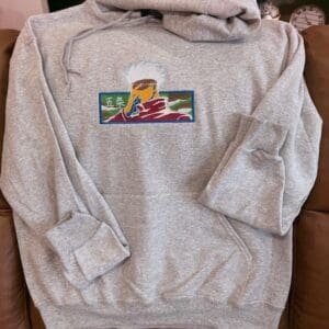 Gray hoodie with colorful embroidered design.