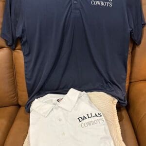 Dallas Cowboys navy and white polo shirts.