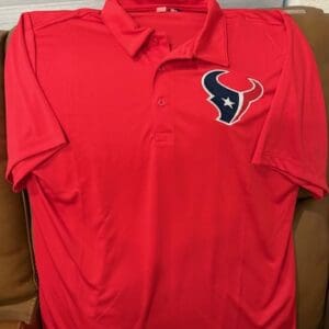 Red polo shirt with sports team logo.
