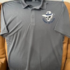 Gray polo shirt with embroidered skull design.